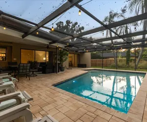 Photo 2 - Family-Friendly 4BR Getaway Saltwater pool