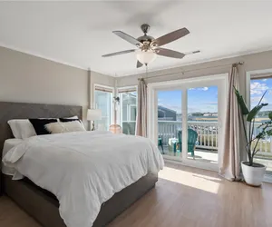 Photo 4 - Waterfront Condo: Rosé All Day with Breathtaking Sunset Views