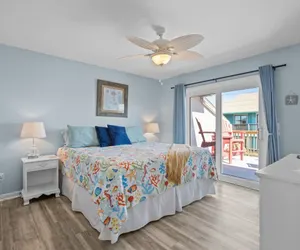 Photo 3 - The Coastal Nest: Steps from the Beach and Poolside Relaxation