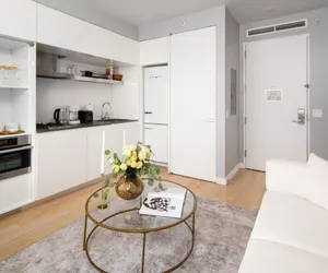 Photo 3 - Stylish & Cozy Apt nr Times Square w Gym + Laundry