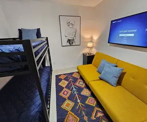 Photo 3 - Comfy Remodeled 2bd near DT.WP & Mills50 District