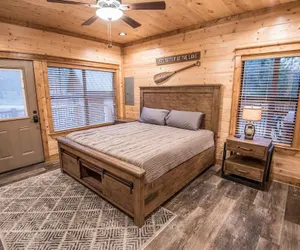Photo 2 - All Decked Out Cabin in the Woods With Fireplace, Bbq, and Swing Bed by Redawning