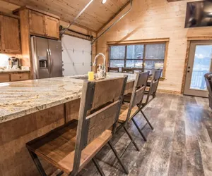 Photo 4 - All Decked Out Cabin in the Woods With Fireplace, Bbq, and Swing Bed by Redawning