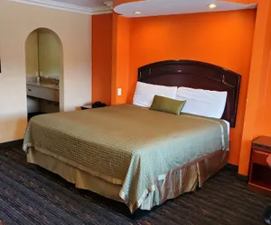 Photo 4 - Delmonico Inn & Suites