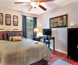 Photo 2 - Urban Oasis W/hot Tub, Heated Pool And Private Movie Theater 2 Bedroom Home by RedAwning