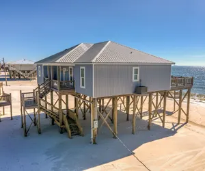 Photo 2 - Awake On The Gulf - Gulf Front! Gaze Up At The Stars From Your Large Deck While Listening To The Waves Crash. 4 Bedroom Home by RedAwning
