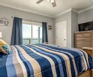 Photo 3 - Awake On The Gulf - Gulf Front! Gaze Up At The Stars From Your Large Deck While Listening To The Waves Crash. 4 Bedroom Home by RedAwning