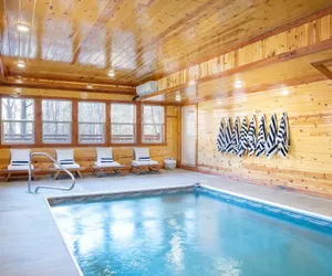 Photo 2 - Sycamore by Avantstay Spectacular Mountain Home w/ Indoor Pool, Hot Tub, Home Theatre & Fire Pit!
