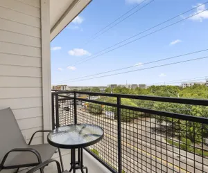 Photo 5 - Modern 1BR King Suite Close to Downtown w Fast Wifi