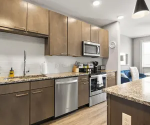 Photo 3 - Modern 1BR King Suite Close to Downtown w Fast Wifi