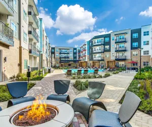 Photo 2 - Grand 1BR King Suite Close to Downtown w Fast Wifi