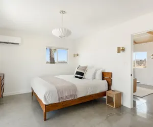 Photo 4 - Relax In Style At The Green Jackrabbit - Hot Tub, Record Player 1 Bedroom Home by RedAwning