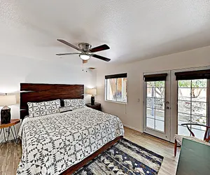 Photo 4 - Rawhide Ranch - Walk To Pappy And Harriet's With Hot Tub! 3 Bedroom Home by RedAwning