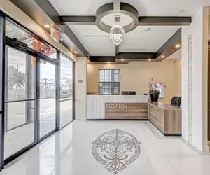 Photo 2 - Comfeeni Inn and Suites