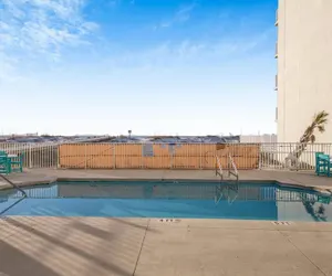 Photo 3 - Cozy Condo on the White Sand Beach With Pool