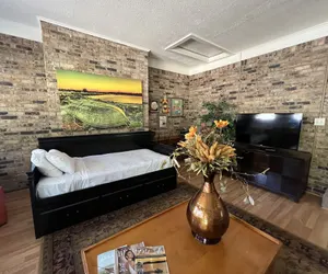 Photo 3 - Two bedroom House with fenced in yard, covered patio area, located at the Joplin Inn at the entrance to Mountain Harbor, just 1 1/2 miles from Lake Ouachita. by RedAwning