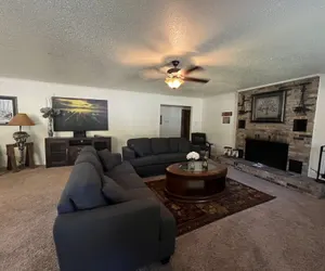 Photo 2 - Two bedroom House with fenced in yard, covered patio area, located at the Joplin Inn at the entrance to Mountain Harbor, just 1 1/2 miles from Lake Ouachita. by RedAwning