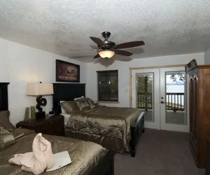 Photo 2 - Luxury three bedroom, three bath cottage with hot overlooking Lake Ouachita. by RedAwning