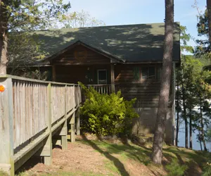 Photo 2 - Two bedroom, two bath, log-sided, luxury Harbor North cottage overlooking Lake Ouachita. by RedAwning