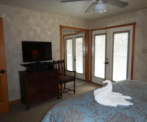 Photo 3 - Luxury, loft, log-sided two bedroom Harbor North cottage on Lake Ouachita. by RedAwning