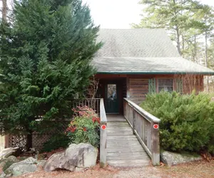 Photo 2 - Luxury, loft, log-sided two bedroom Harbor North cottage on Lake Ouachita. by RedAwning
