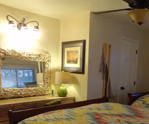 Photo 2 - Poolside Queen Cabana with two queen beds, full kitchen and pool access overlooking Lake Ouachita. by RedAwning