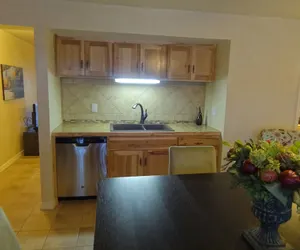 Photo 5 - Poolside Queen Cabana with two queen beds, full kitchen and pool access overlooking Lake Ouachita. by RedAwning