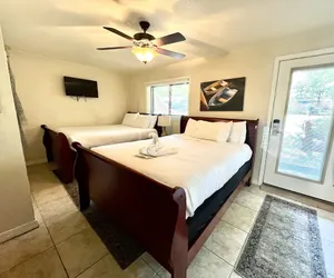 Photo 3 - Poolside Queen Cabana with two queen beds, full kitchen and pool access overlooking Lake Ouachita. by RedAwning