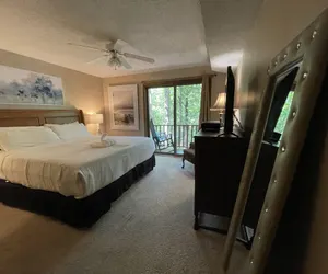 Photo 2 - Forest view, log-sided two bedroom, two bath condo on Lake Ouachita. 2 Condo by RedAwning