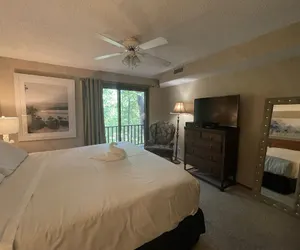 Photo 5 - Forest view, log-sided two bedroom, two bath condo on Lake Ouachita. 2 Condo by RedAwning