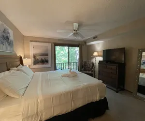 Photo 4 - Forest view, log-sided two bedroom, two bath condo on Lake Ouachita. 2 Condo by RedAwning