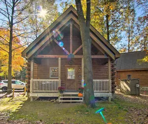 Photo 3 - Rustic Rothbury Cabin w/ Resort Amenity Access!