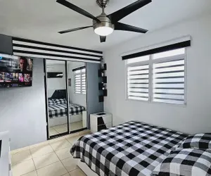 Photo 2 - Cozy and Modern Apartment Black & White With Jacuzzi on Terrace