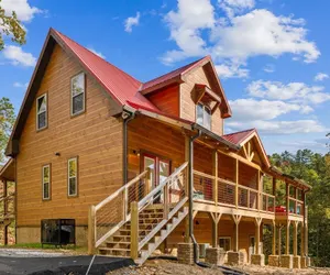 Photo 2 - Hidden Cove Chalet 5 Bedroom Cabin by RedAwning
