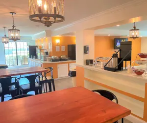 Photo 4 - Casa Bella Inn & Suites Extended Stay