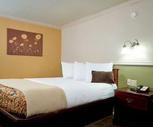 Photo 2 - Family Garden Inn & Suites