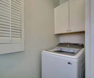 Photo 4 - Sunny Waveland Home Rental w/ Pool: Walk to Beach!