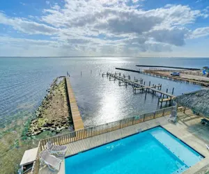 Photo 4 - Waterfront w/ Bay Views, Shared Pool & Boat Dock Marlin Madness by Avantstay