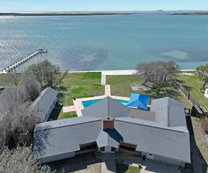 Photo 2 - Whispering Breezes At Windy Hill 4 Bedroom Home by RedAwning