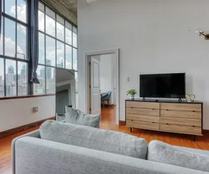 Photo 3 - Sosuite 2BR Penthouse w W D Gym On-site Bar