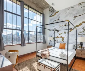 Photo 2 - Sosuite 2BR Penthouse w W D Gym On-site Bar