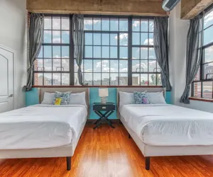 Photo 4 - Sosuite 2BR Apt w Patio W D Gym On-site Bar