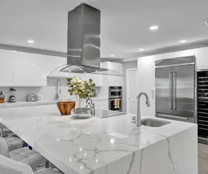 Photo 2 - Luxe 4BR Waterfront w Htd Pool 5min to Beach