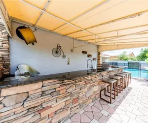 Photo 5 - Luxe 4BR Waterfront w Htd Pool 5min to Beach