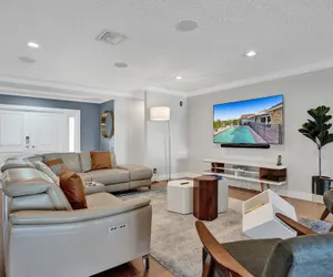 Photo 4 - Luxe 4BR Waterfront w Htd Pool 5min to Beach