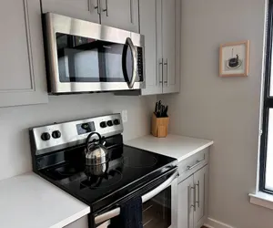 Photo 3 - Sosuite 1BR Apt w W D Shared Roofdeck