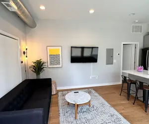 Photo 2 - Sosuite 1BR Apt w W D Shared Roofdeck