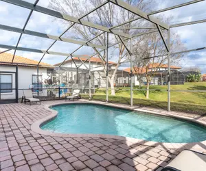 Photo 2 - Poolside Serenity Near Disney World 4 Bedroom Home by RedAwning