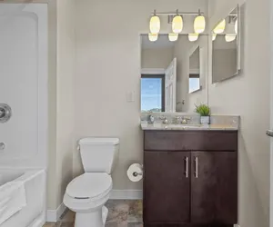 Photo 5 - Sleek 2BR Downtown Retreat with Gym