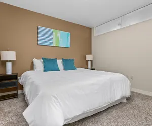 Photo 2 - Sleek 2BR Downtown Retreat with Gym